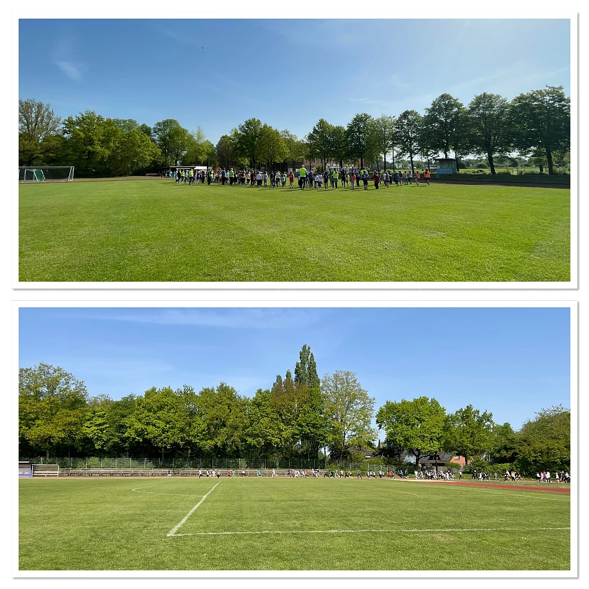 auf dem Foto sieht man den grünen Rasen der Bezirkssportanlage Hemelingen. Im Hintergrund laufen Kinder über die Tartanbahn